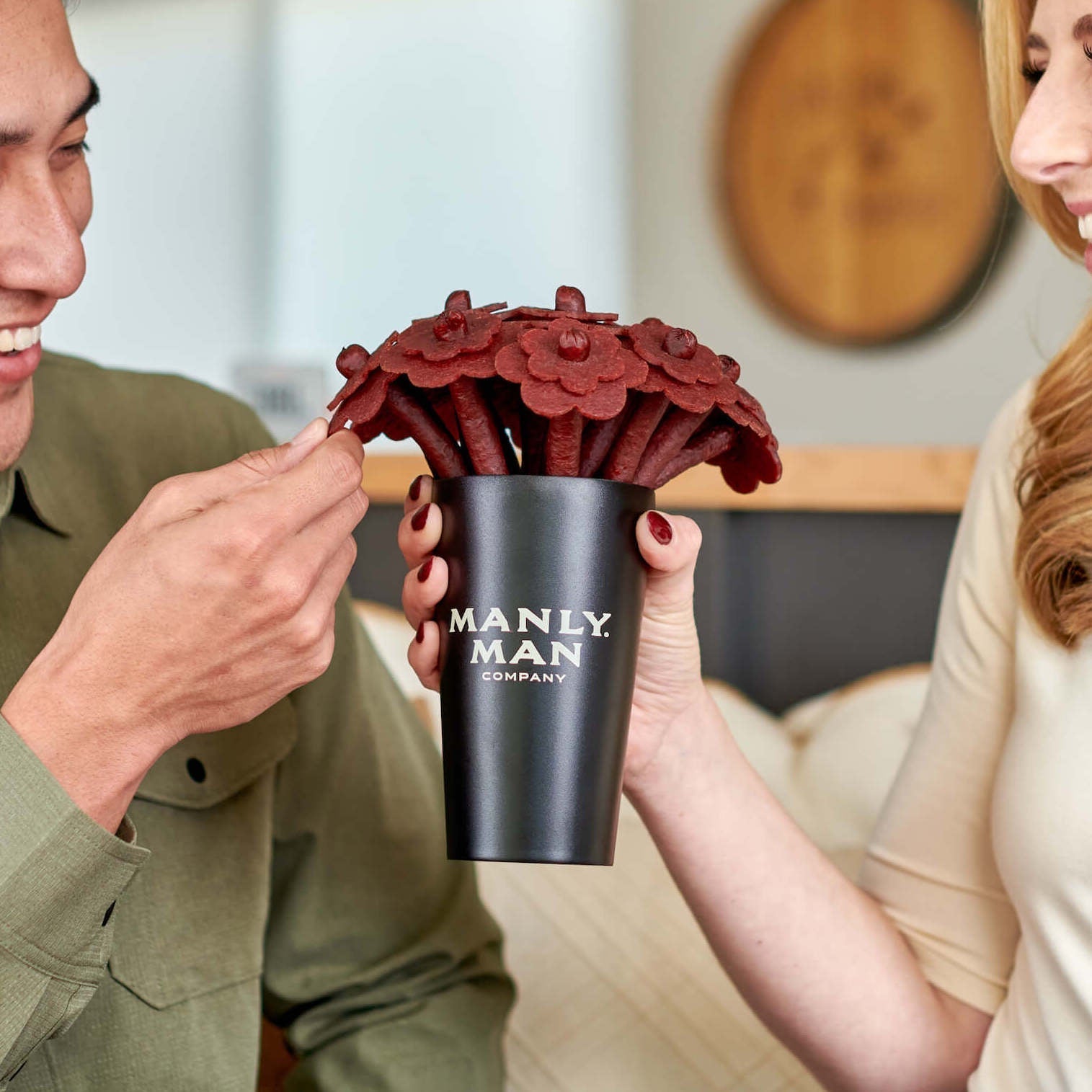 Beef Jerky Flower Bouquet from Manly Man Co. handed to dad—because real flowers don’t come with protein.