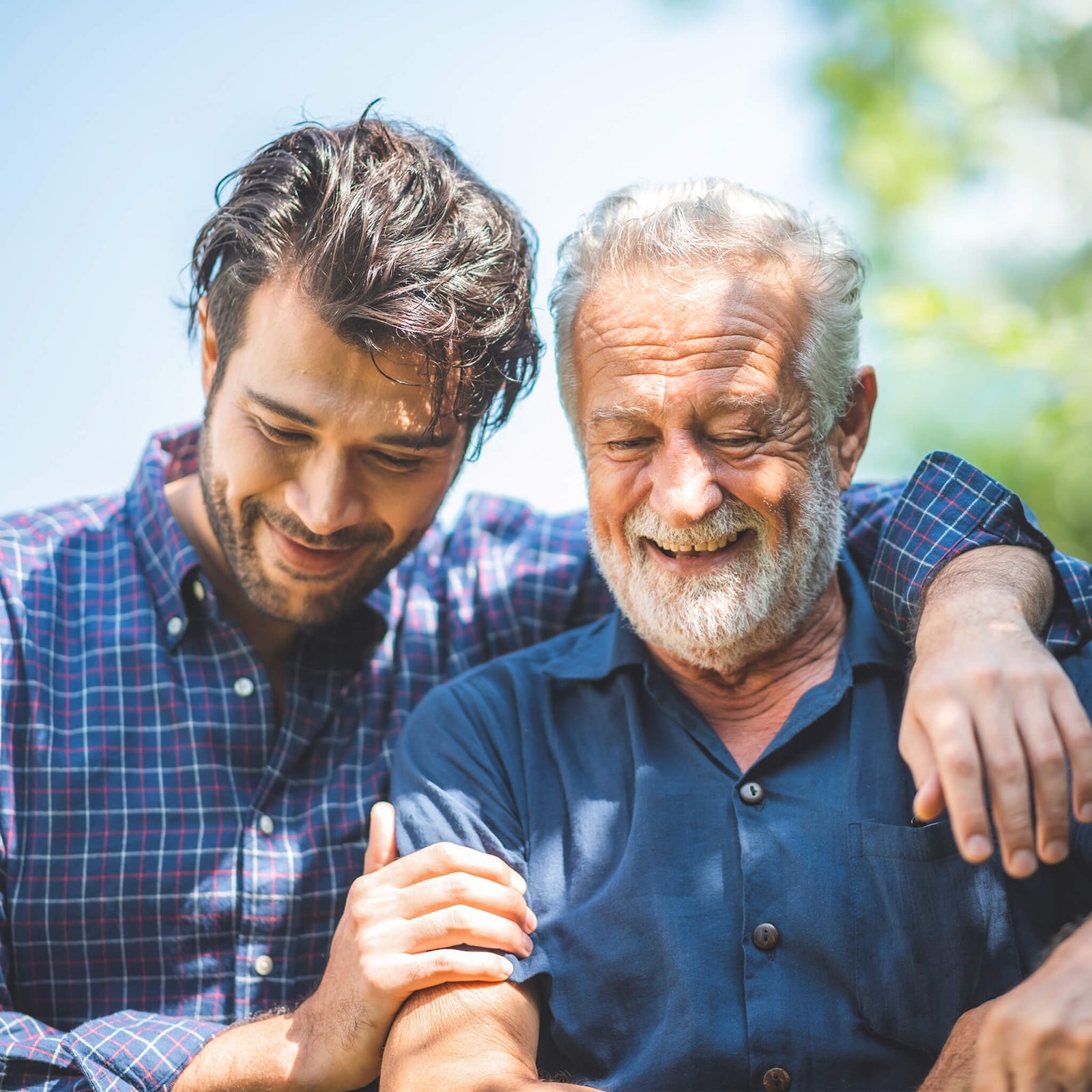 A selection of savory food gifts for seniors, including beef jerky bouquets, personalized meat cards, and gourmet jerky gift boxes.