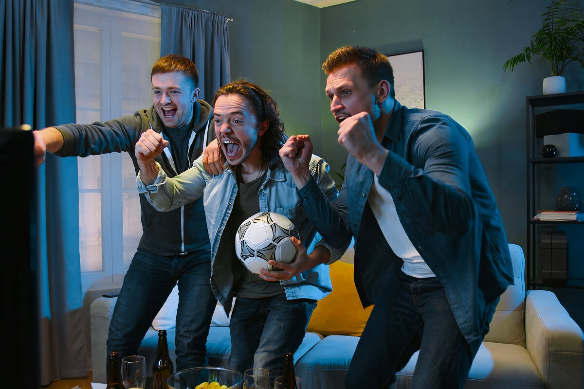 Groomsmen laughing and celebrating—capture the same energy with epic proposal gifts like personalized flasks and jerky bouquets.