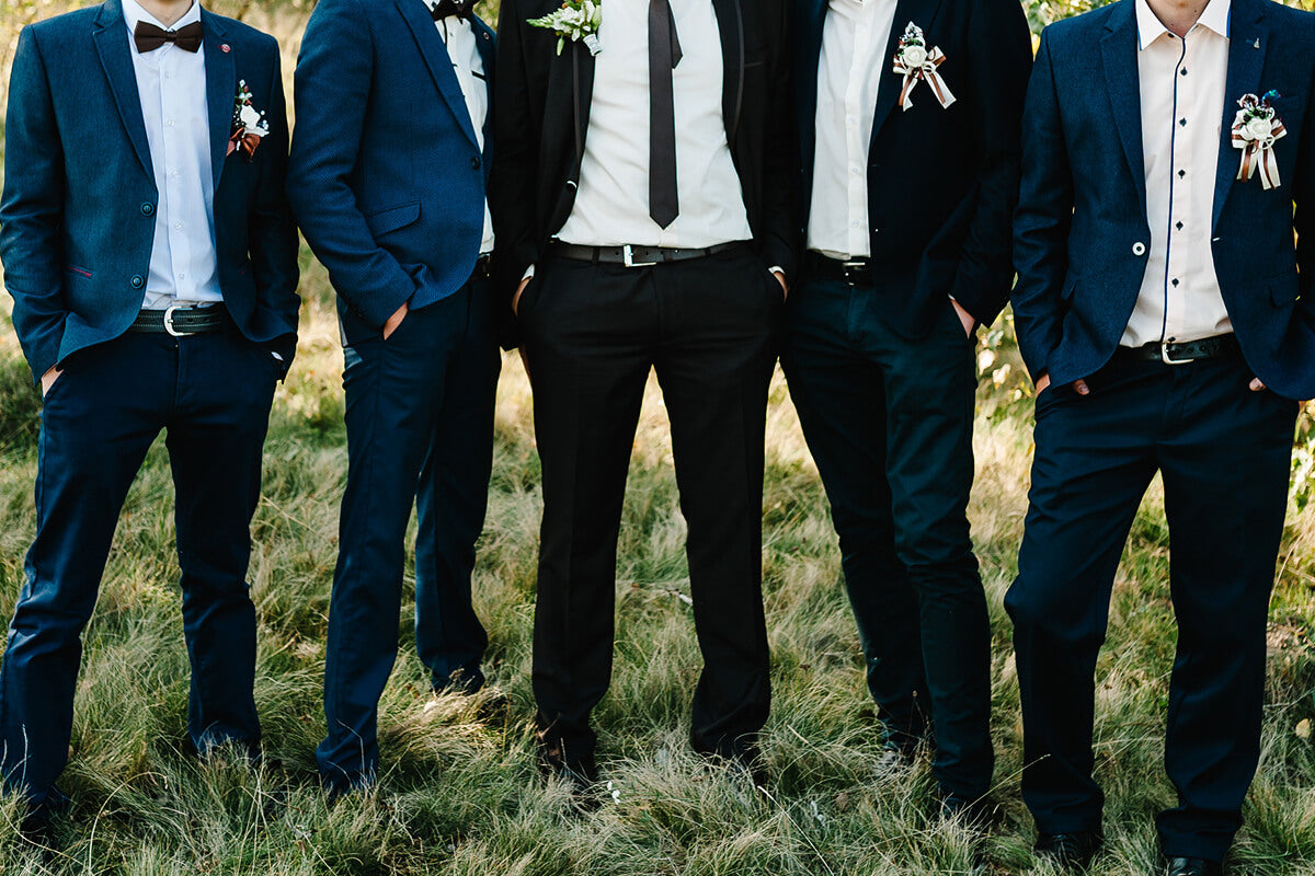 Unique groomsmen proposal gifts from Manly Man Co., including personalized ammo cans, meat cards, and flask sets.