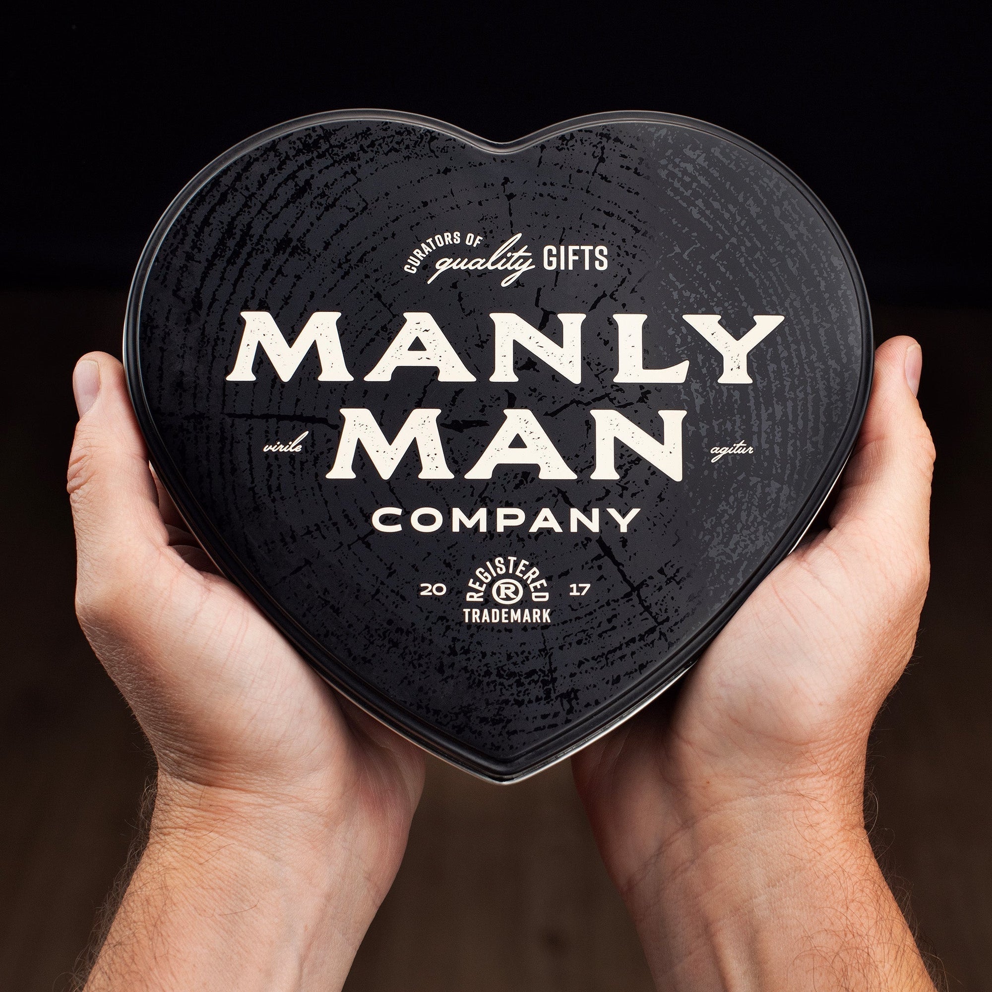 Christmas gifts for men from Manly Man Co. including single malt scotch caramels in a heart shaped box
