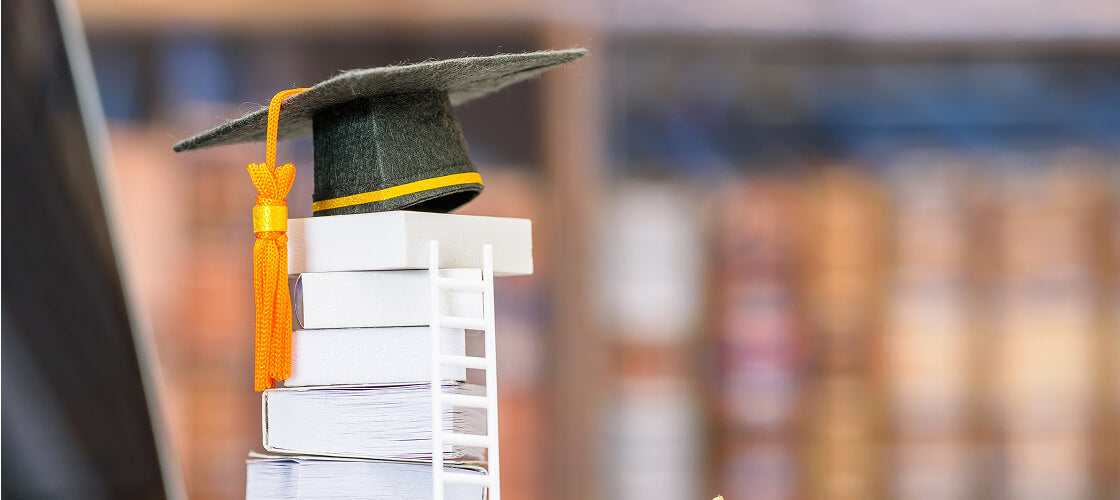 Teacher graduation gift ideas including jerky bouquets, snack boxes, bacon jerky gift sets, and personalized edible gifts for future educators.