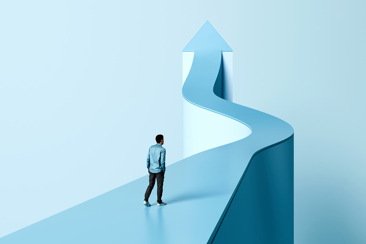 Teacher silhouette facing an upward path—illustrating their role in guiding student futures.
