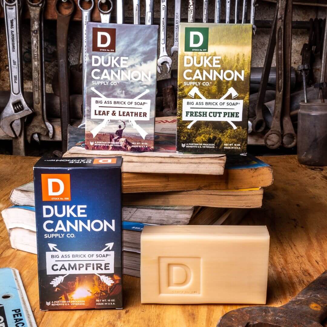 Four bards of Duke Cannon soap, sitting in tool shed
