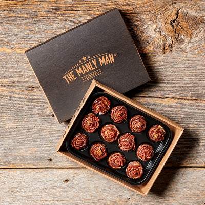 Bacon roses on wood backdrop, given as a manly gift