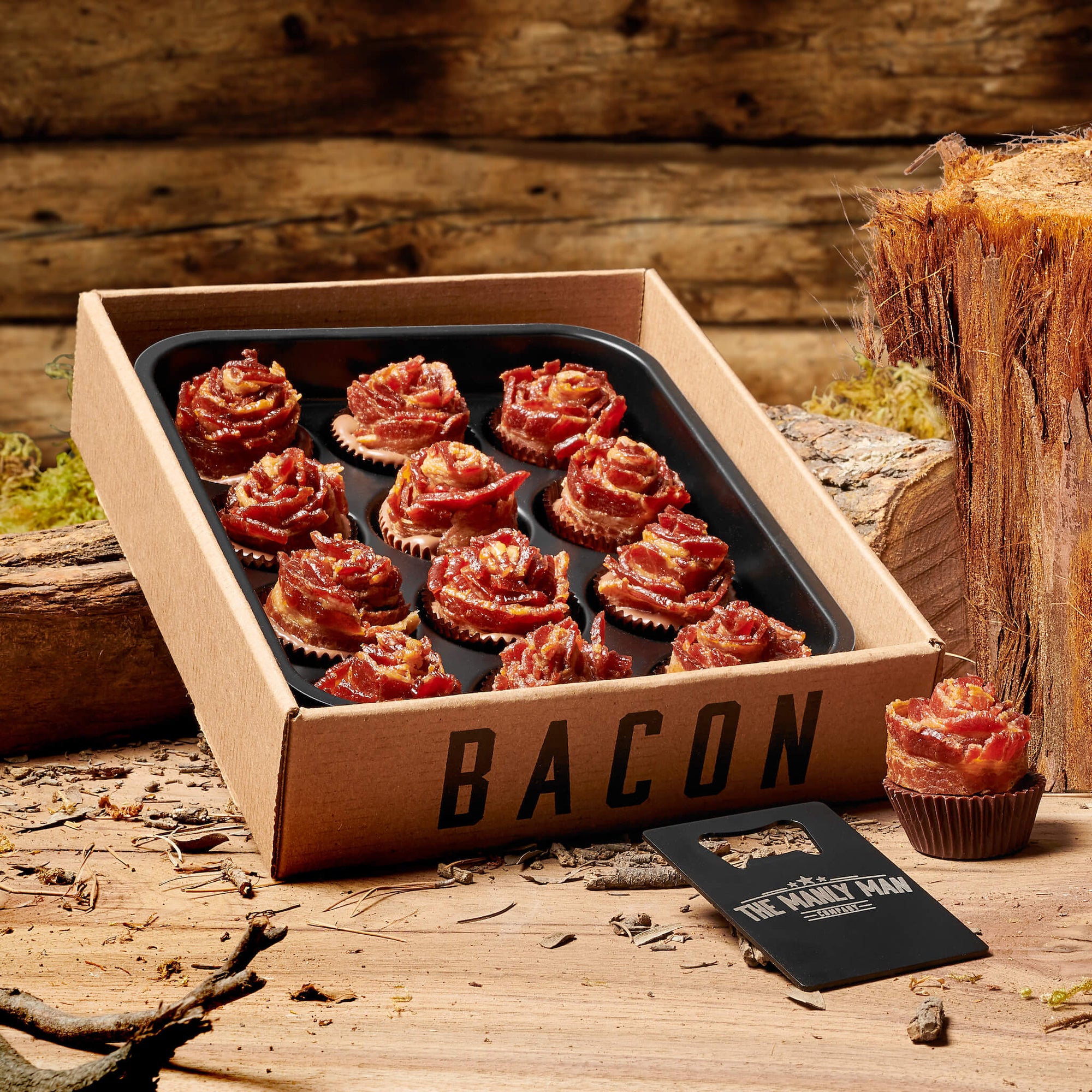Bacon roses sitting on top of wood and surrounded by wood shavings