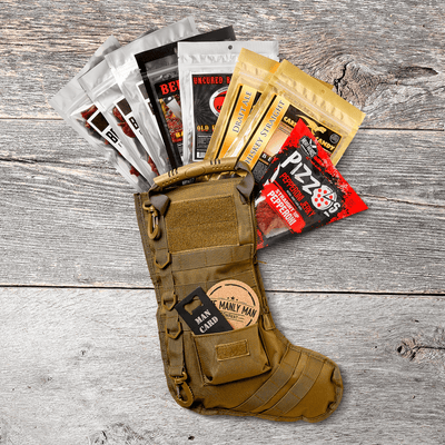 Tactical Christmas stocking bouquet filled with various types of jerky on grey, wood panel background